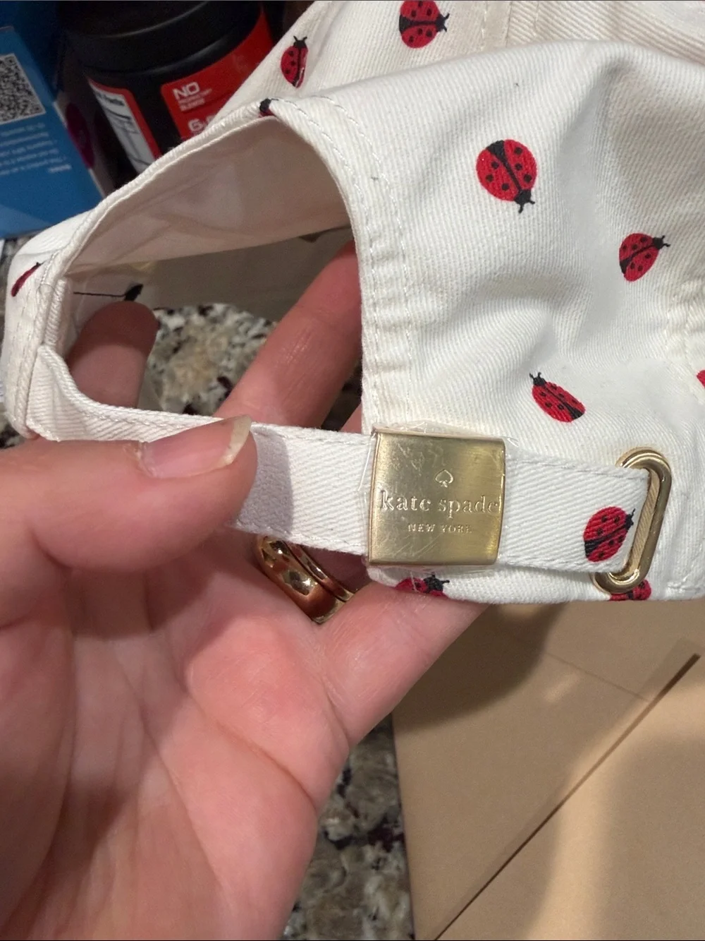 kate spade Cream Baseball Cap with Red Ladybug Print